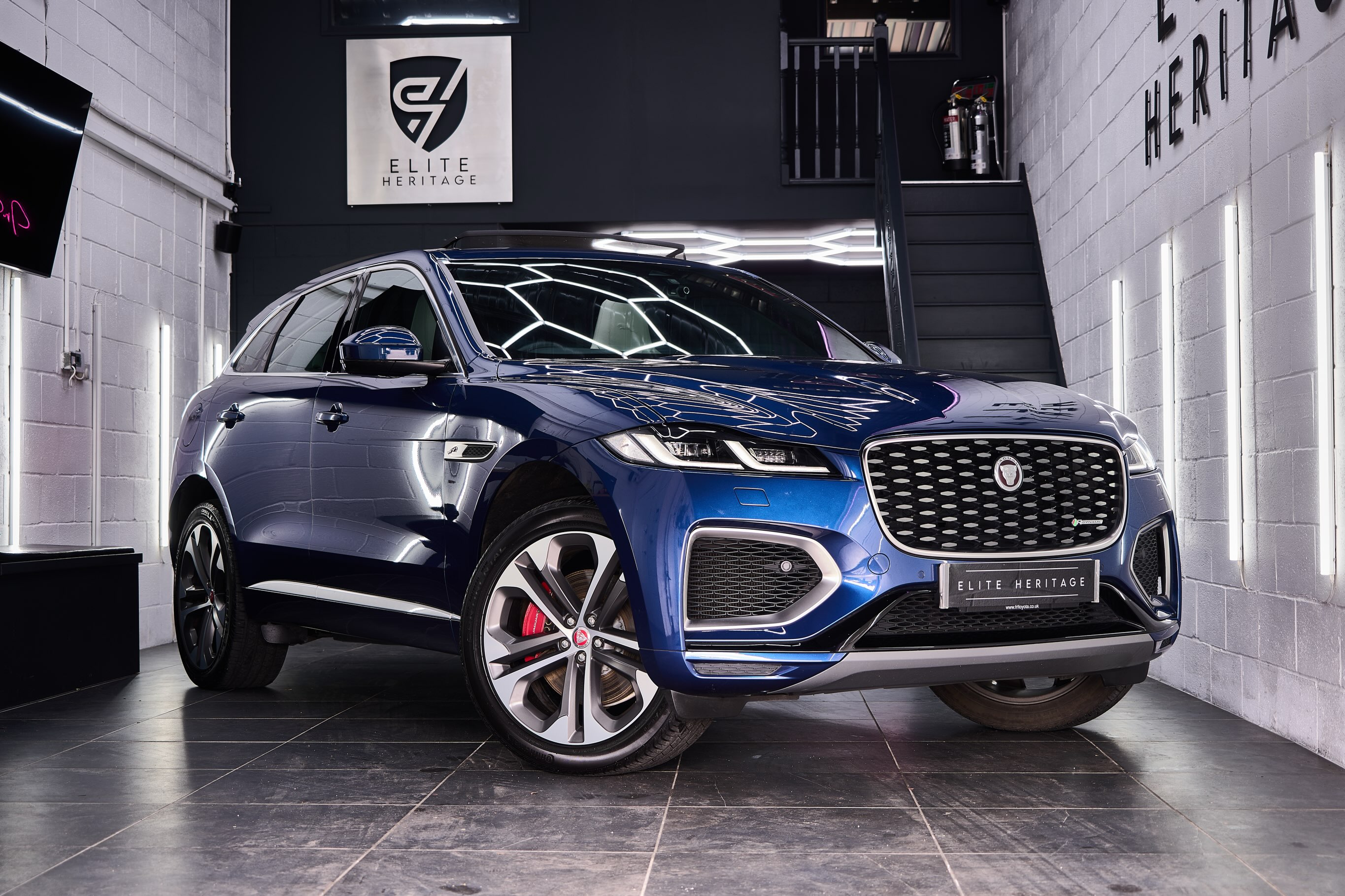 Blue Jaguar F-Pace in the Elite Heritage showroom